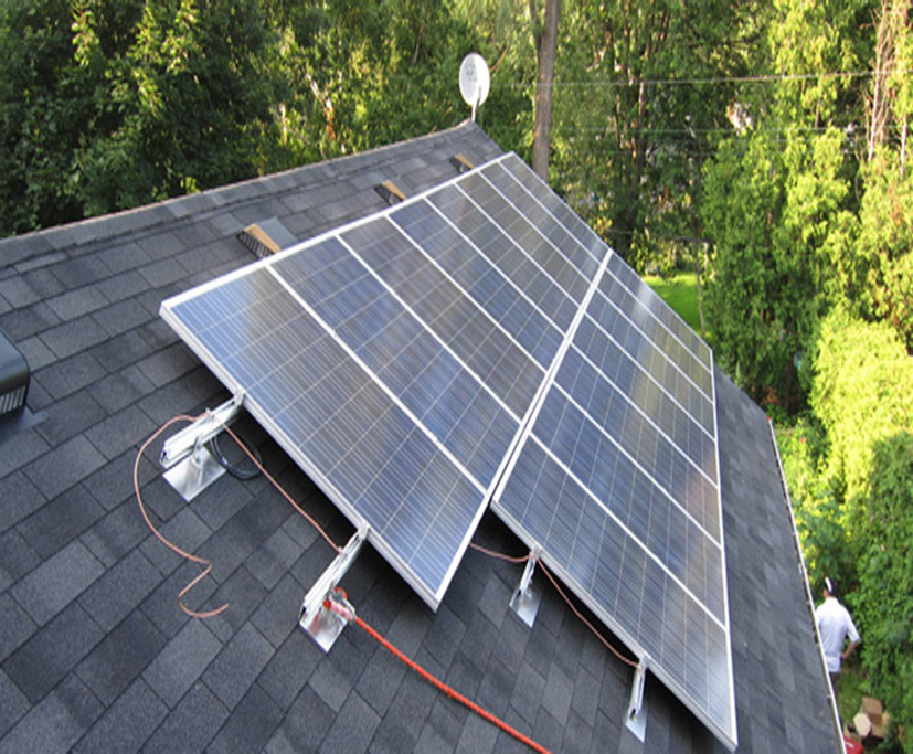 How are solar panels fixed to a sloping roof?